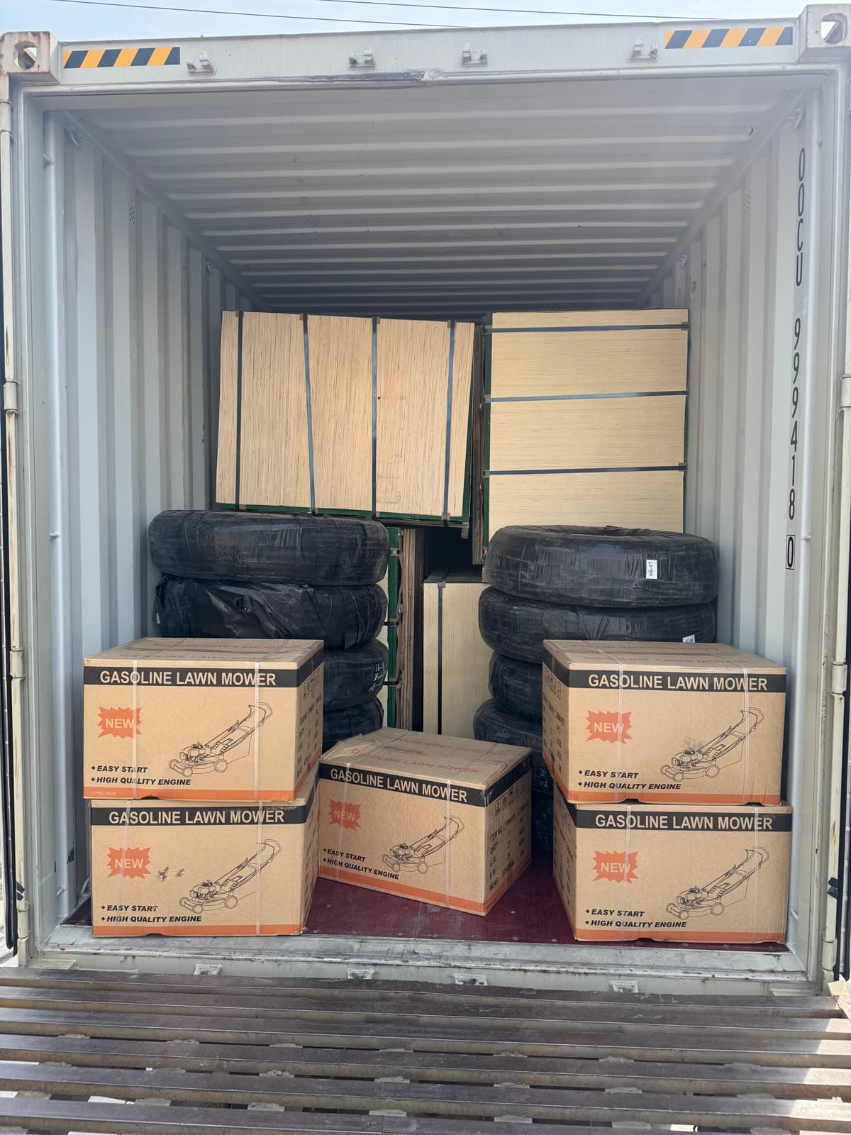 Cartons and wrapped goods packed tightly together