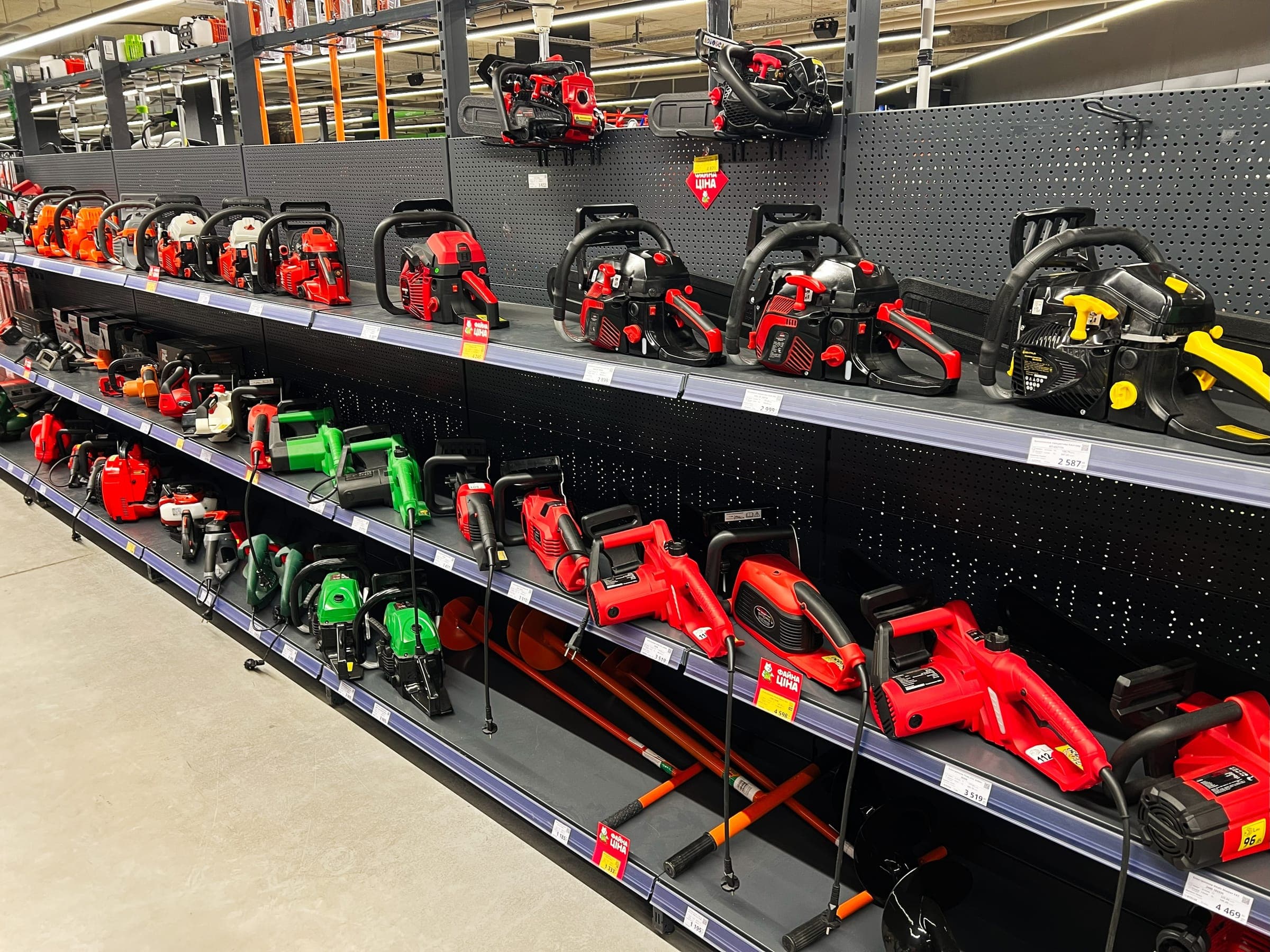 Wall of chainsaws and garden power tools
